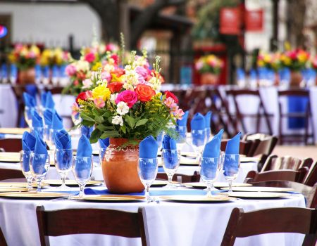 Beautiful table setting at an outdoor wedding venue.