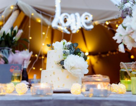 Wedding cake decorated with peony flowers